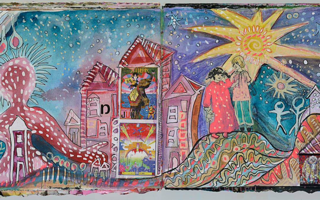A wide visual journal spread: a pink dotted figure beside a tree, painted houses, two girls standing on a patterned hill, a large yellow sun and a crescent moon in a starry blue sky